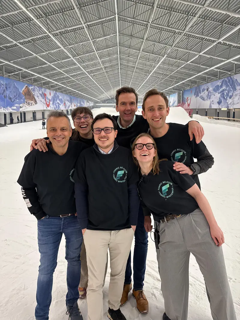 The Winterfest crew in Fabric Belgium shirts on the indoor ski slope